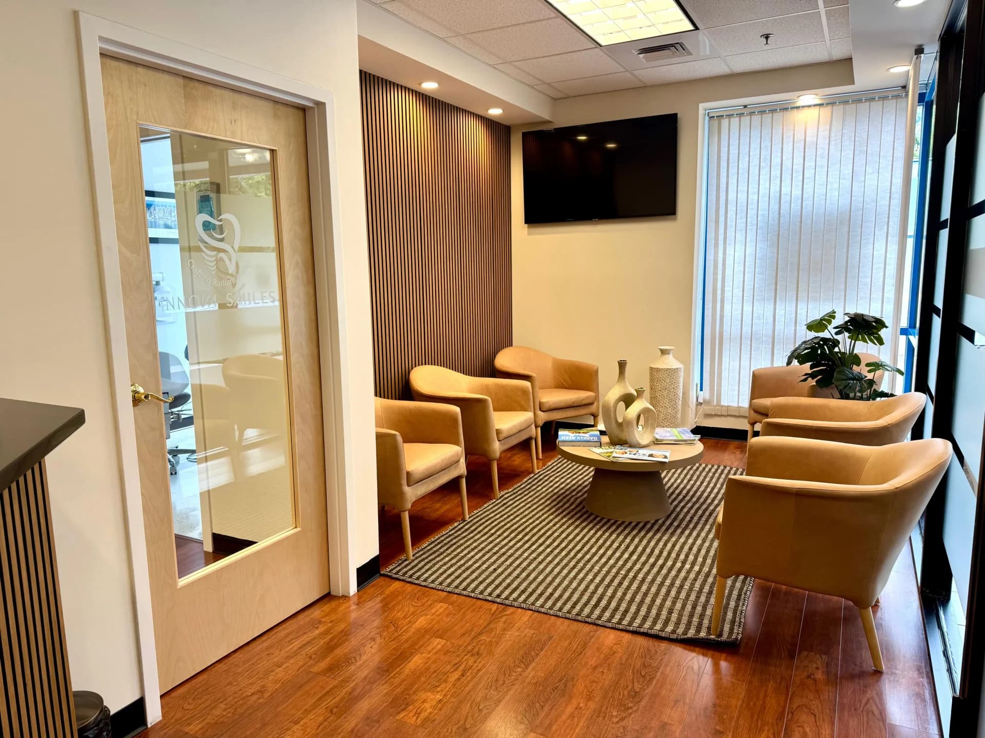 Modern, welcoming waiting area at Innova Smiles in Marlborough, MA