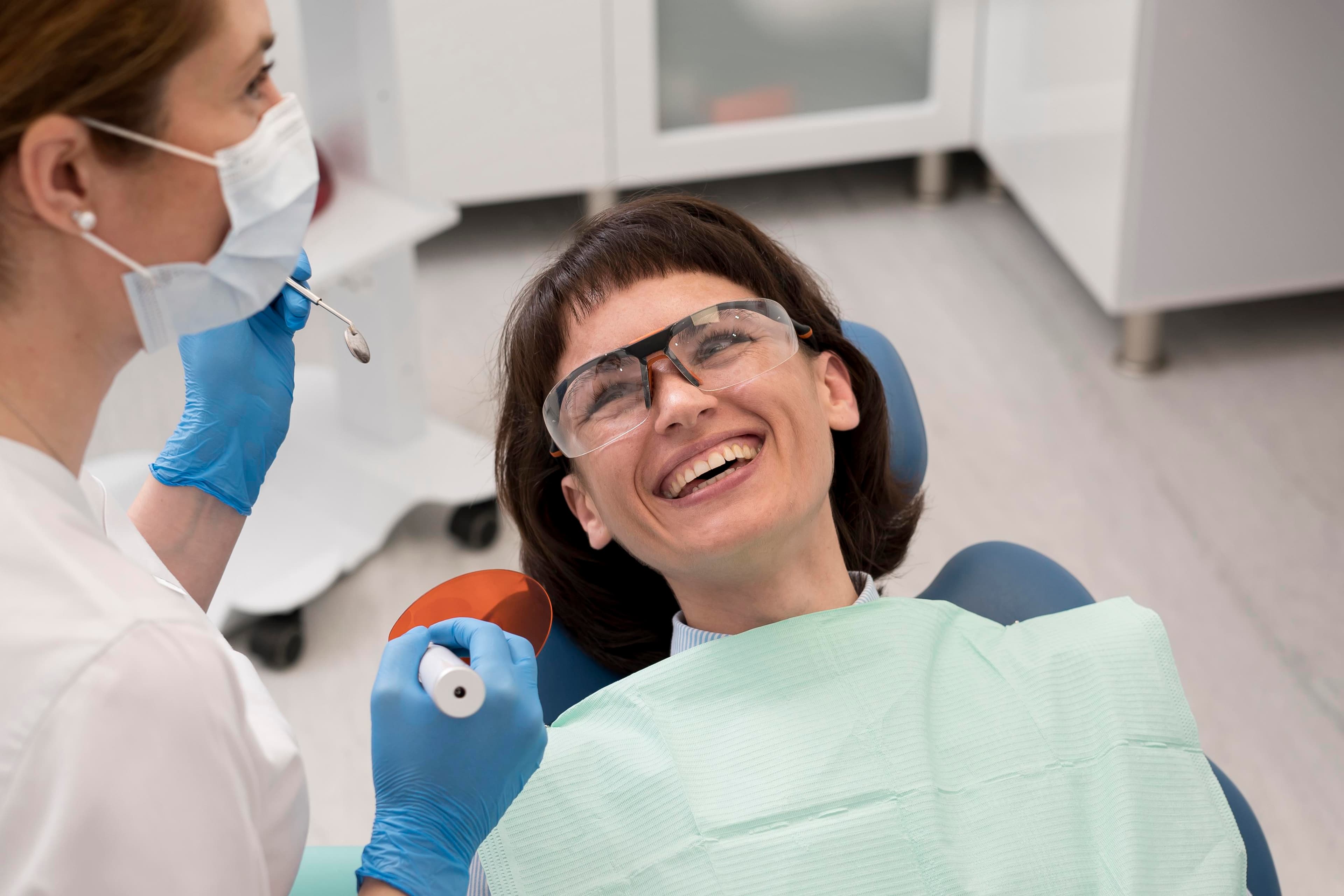 Patient smiling after completing a dental makeover